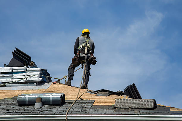 Professional Roof Repair technician working in Rossville, MD
